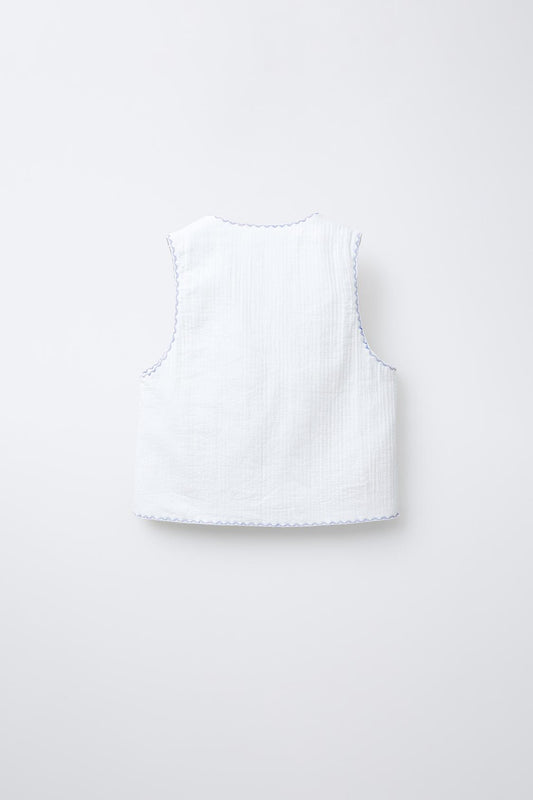 Chaleco acolchado bordado contraste