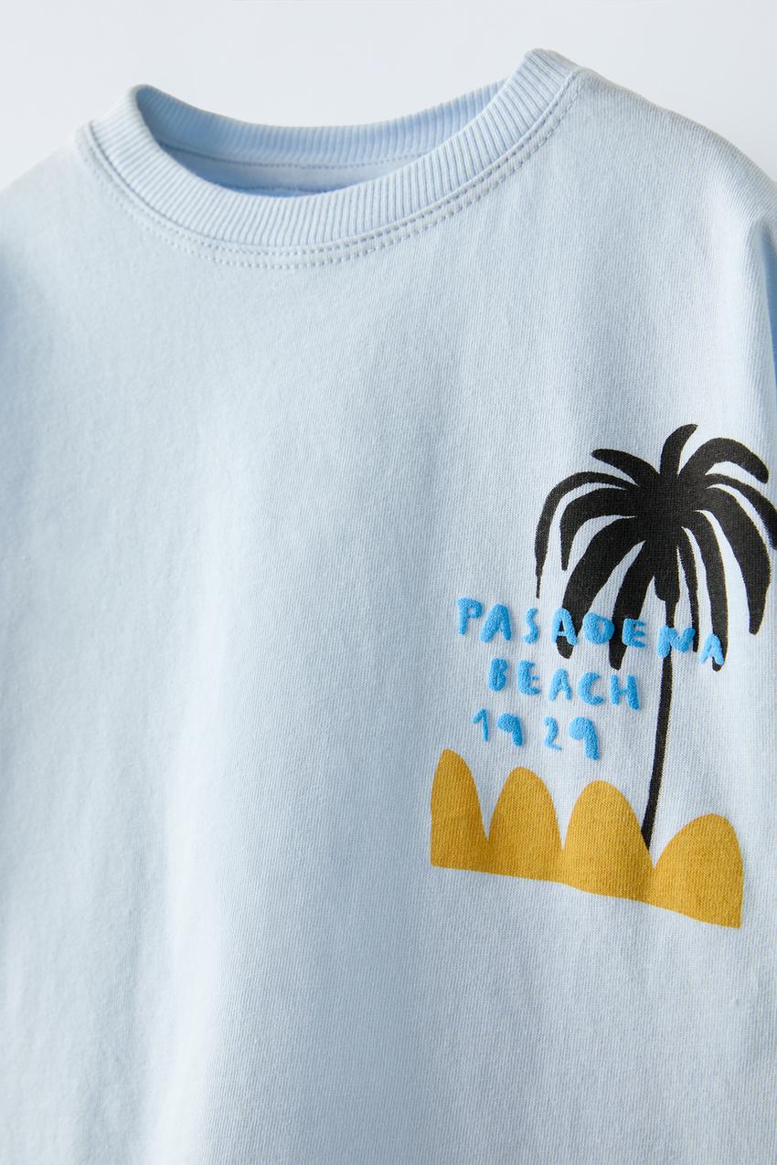 Polera palmeras y olas
