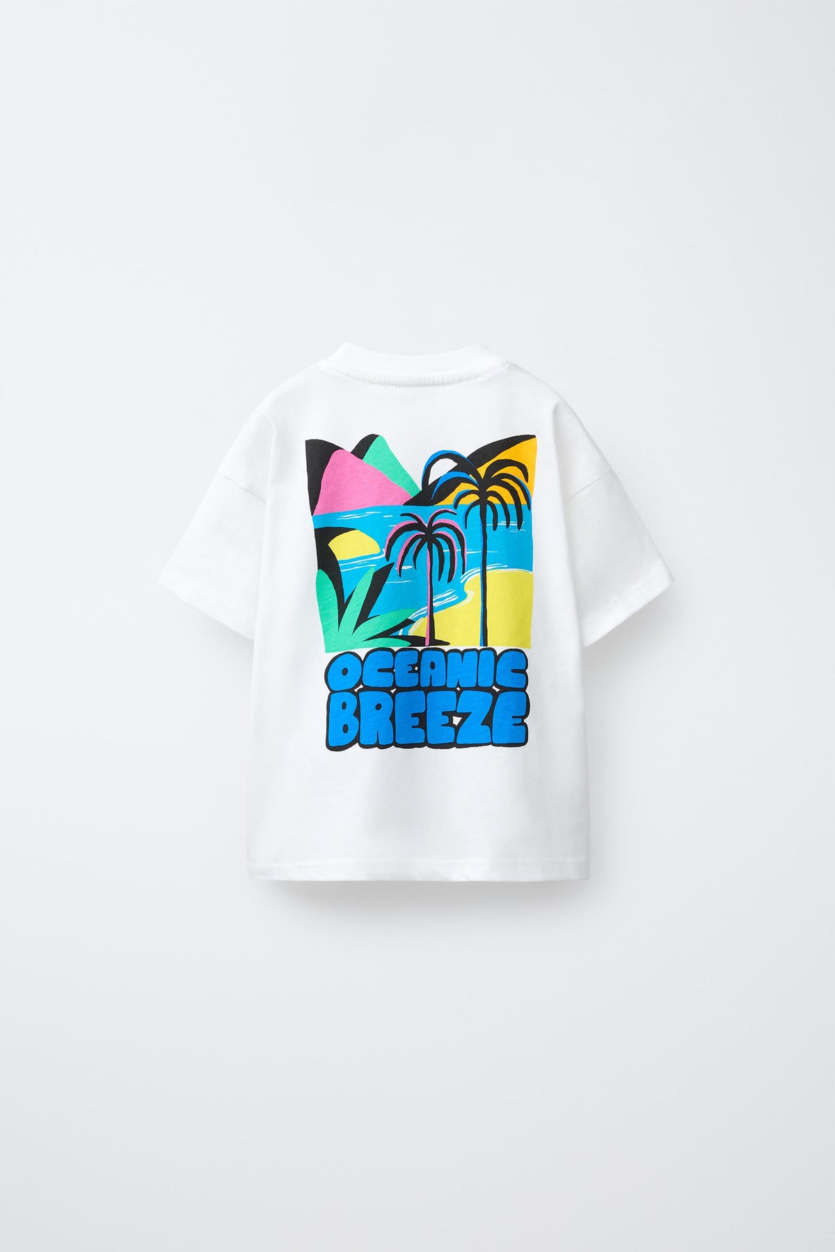 Polera estampado palmeras