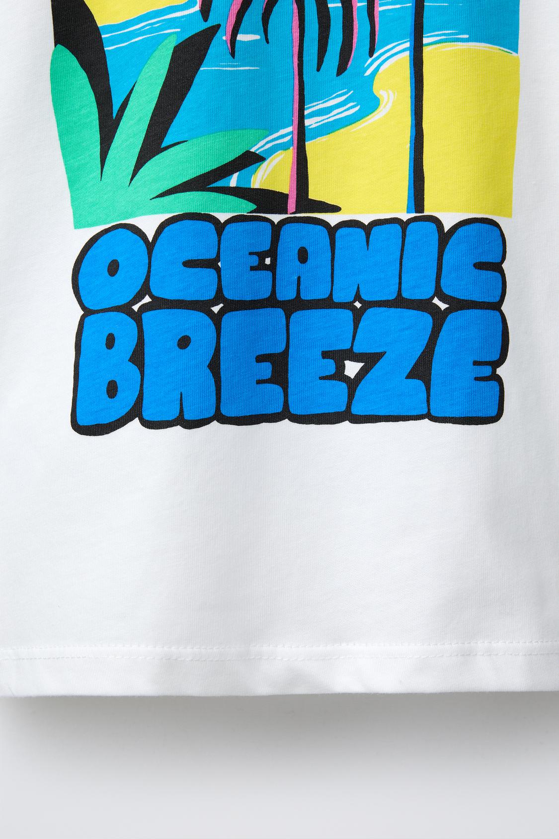 Polera estampado palmeras