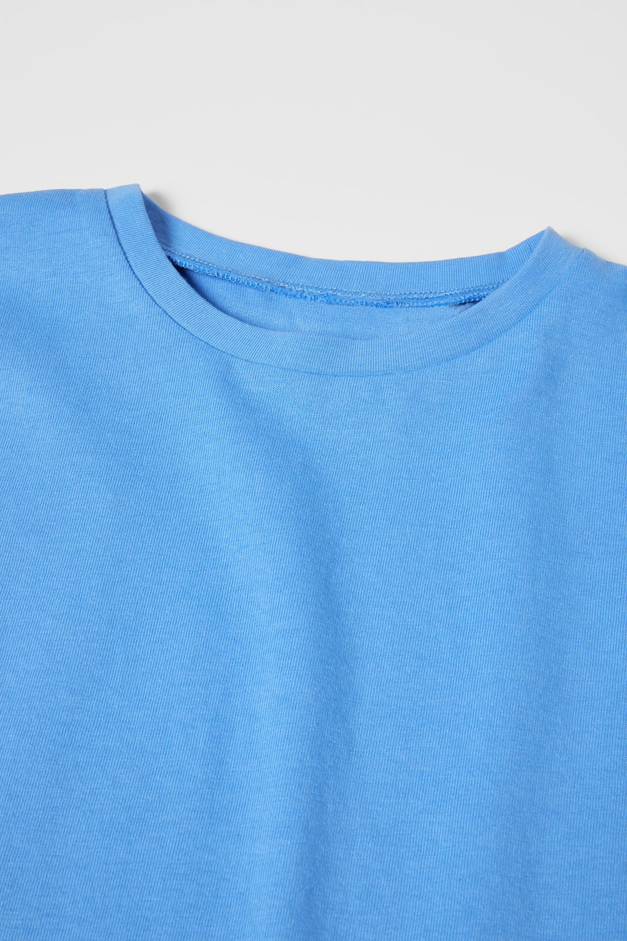 Polera volantes azul