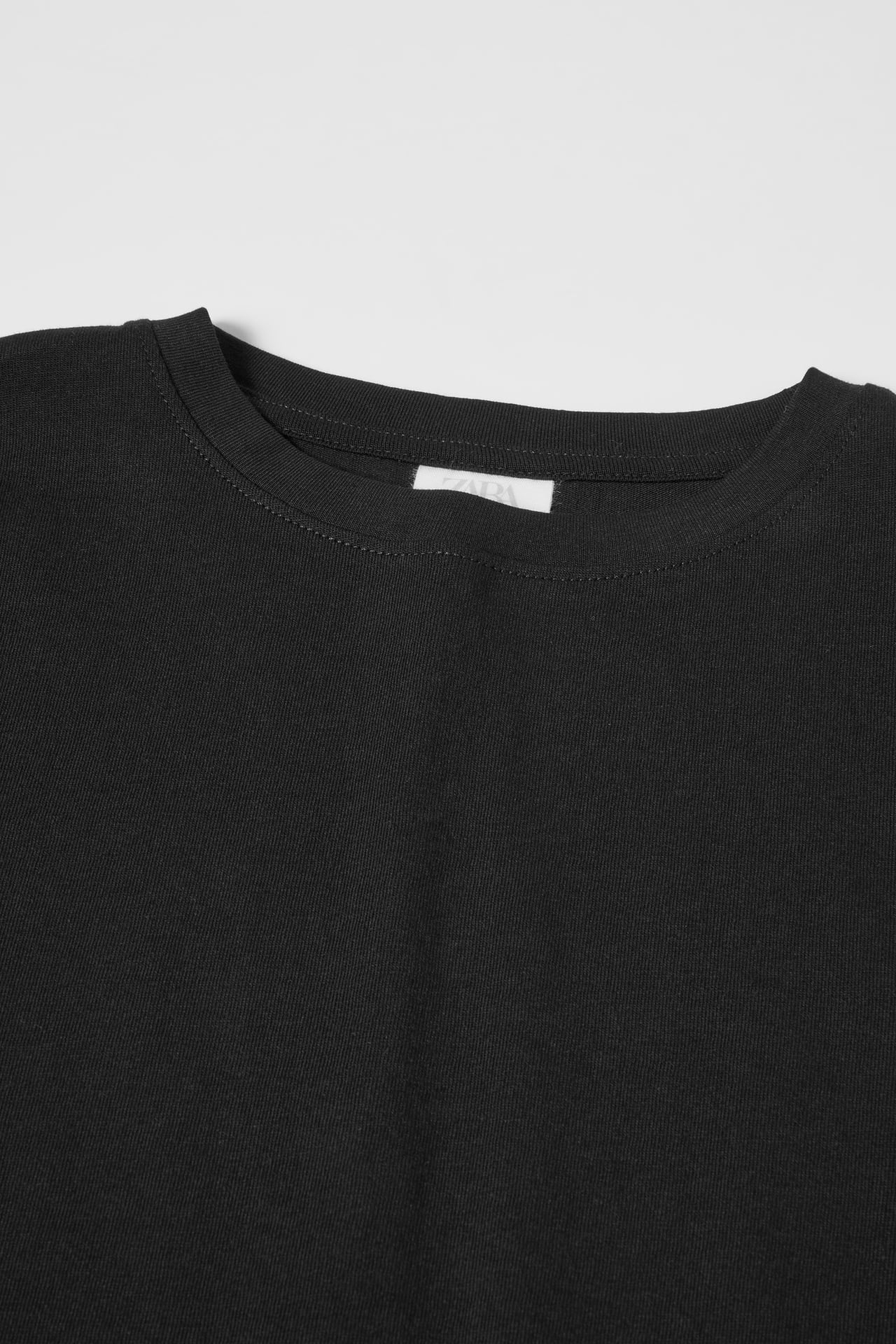 Polera negra lisa