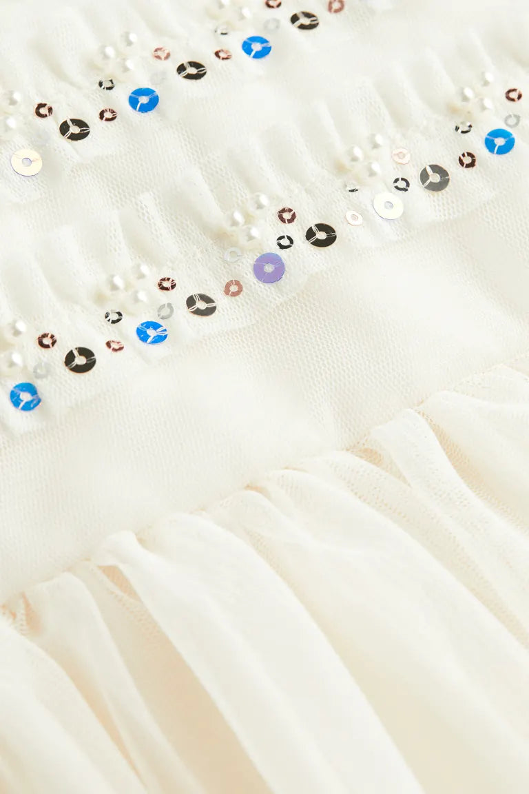 Vestido de tul con detalles