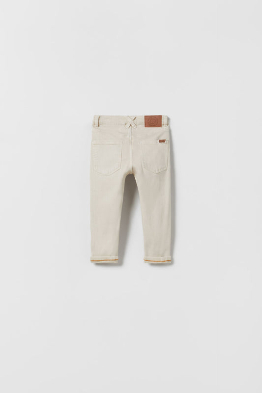 Jeans slim color marfil