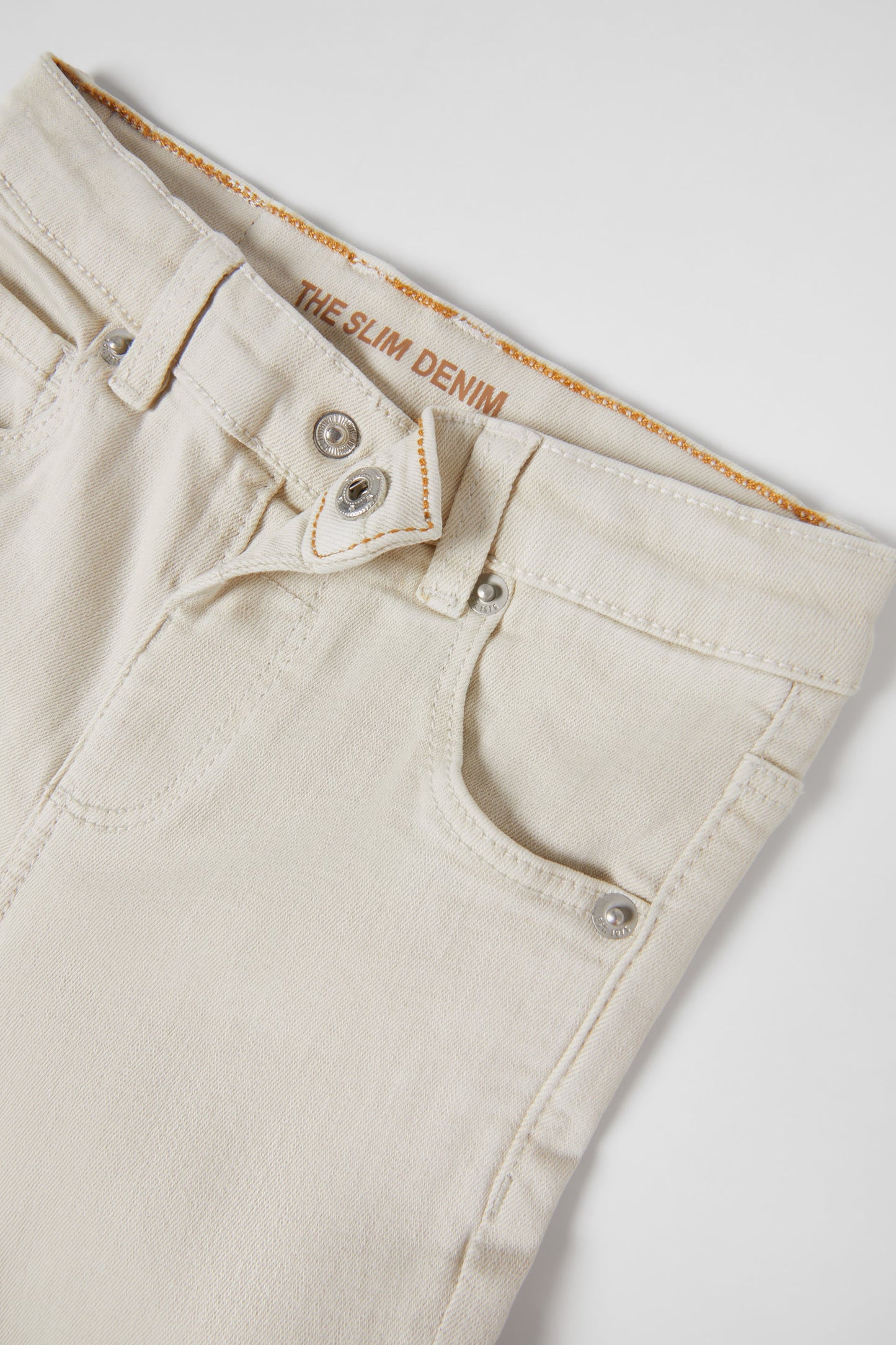 Jeans slim color marfil