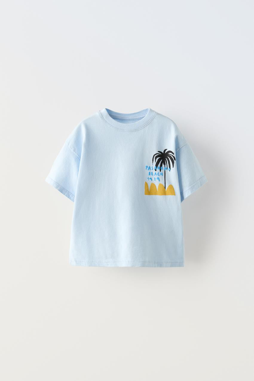 Polera palmeras y olas