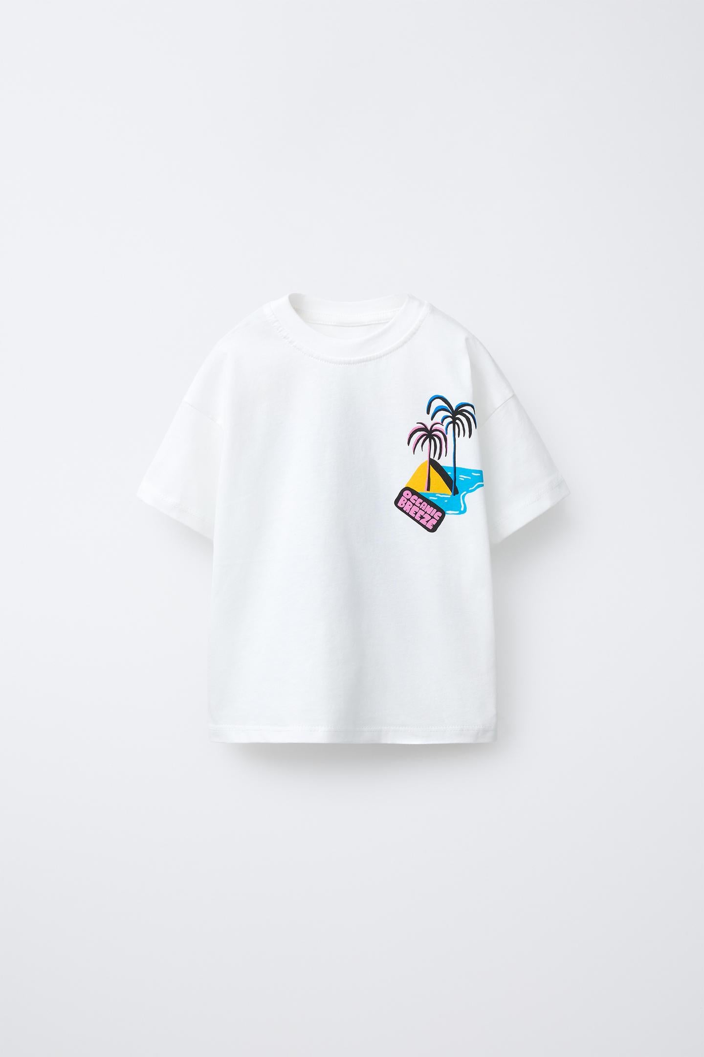 Polera estampado palmeras