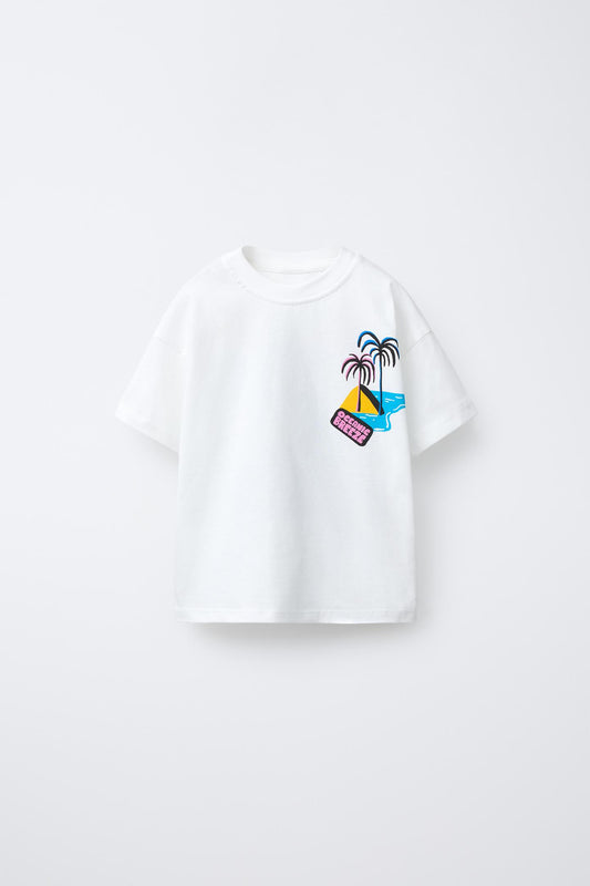 Polera estampado palmeras