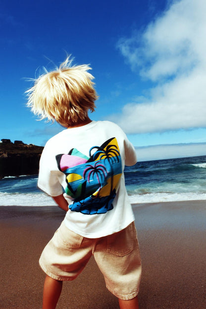 Polera estampado palmeras