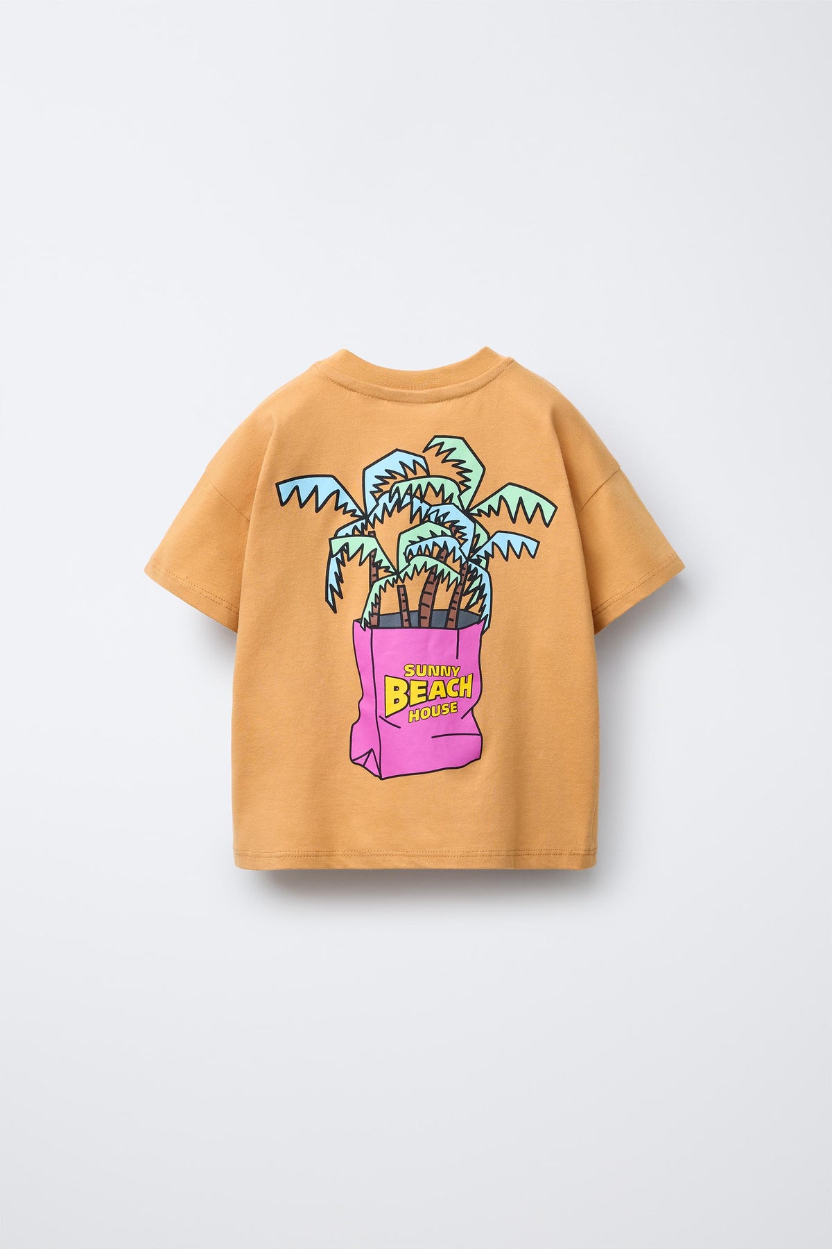 Polera estampada palmeras