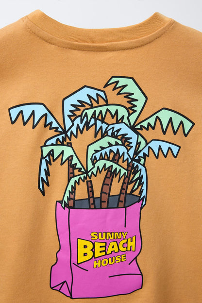 Polera estampada palmeras