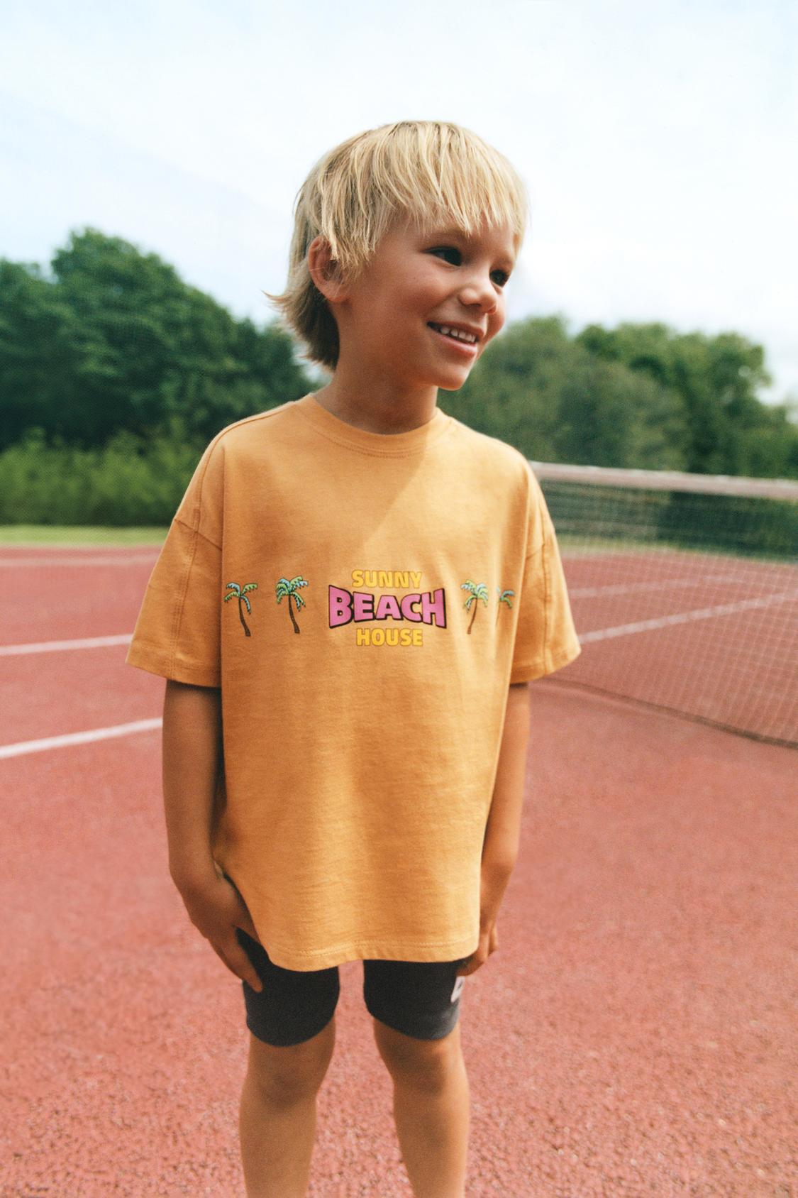 Polera estampada palmeras