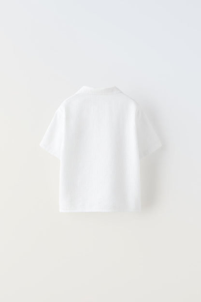 Camisa polo blanca
