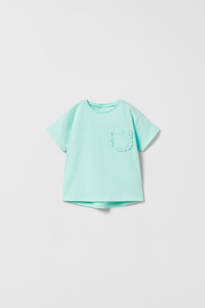 Polera bolsillo turquesa