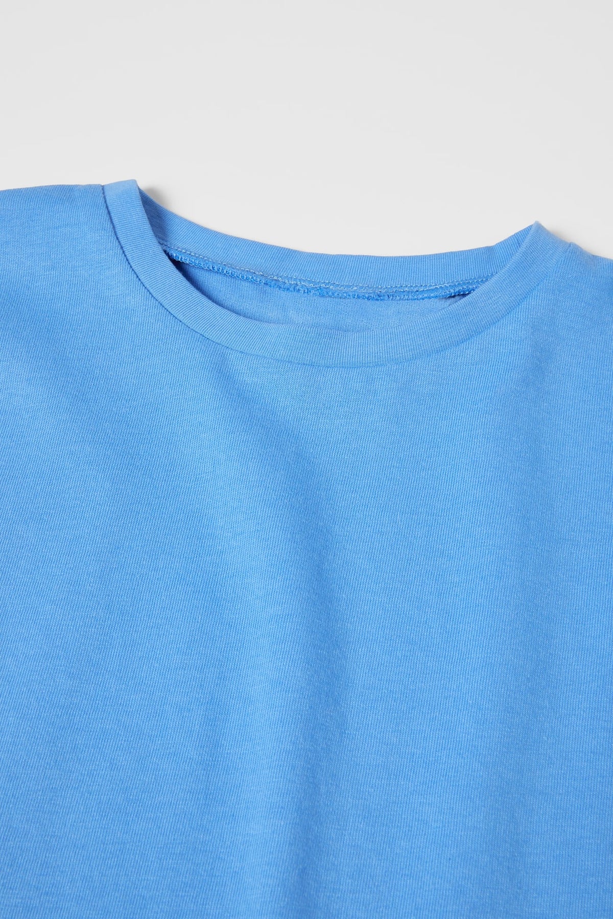 Polera volantes azul