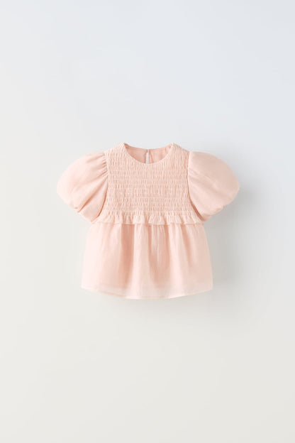 Blusa nido de abeja