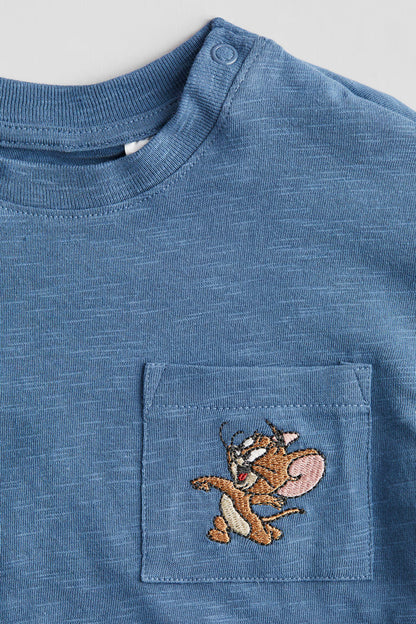 Polera bolsillo tom & yerry