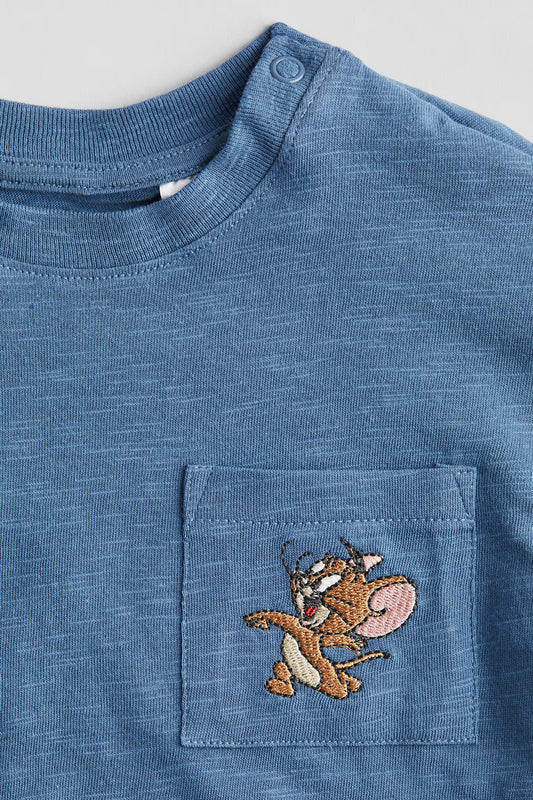 Polera bolsillo tom & yerry